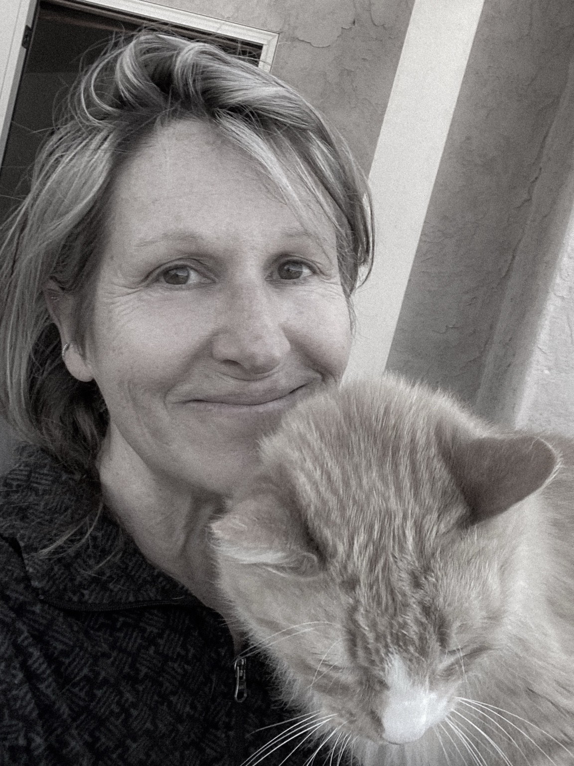 Larkin Nyad with a cat